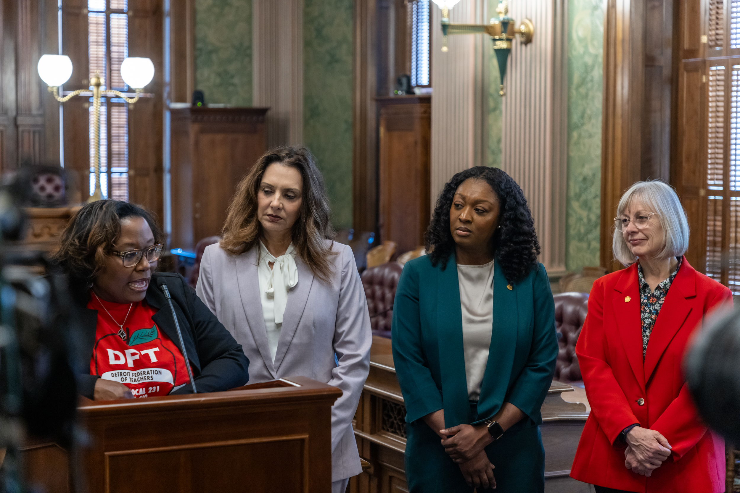 Sen. Sarah Anthony stands with teachers to call for additional resources and funding. 