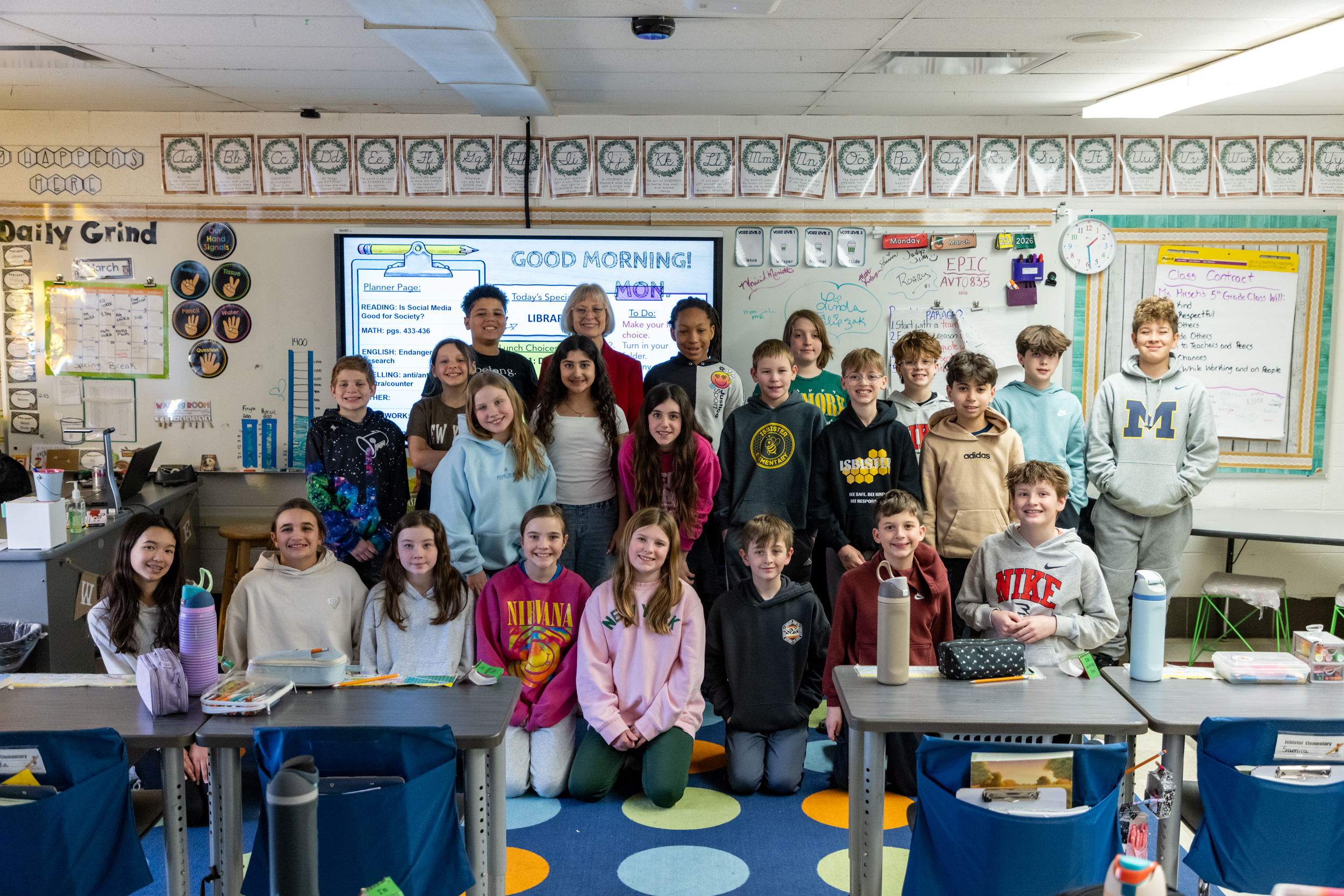 Sen Bayer and a class of children at  

Celebrating Reading Month at Isbister Elementary School in Plymouth in a classroom