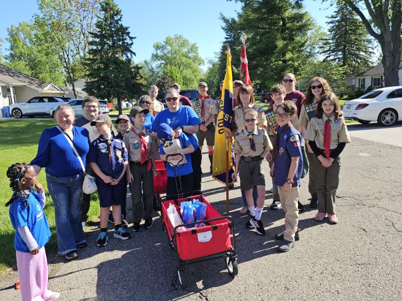 Sen Bayer with a boyscout troop in the Keego Harbor Memorial Day Parade