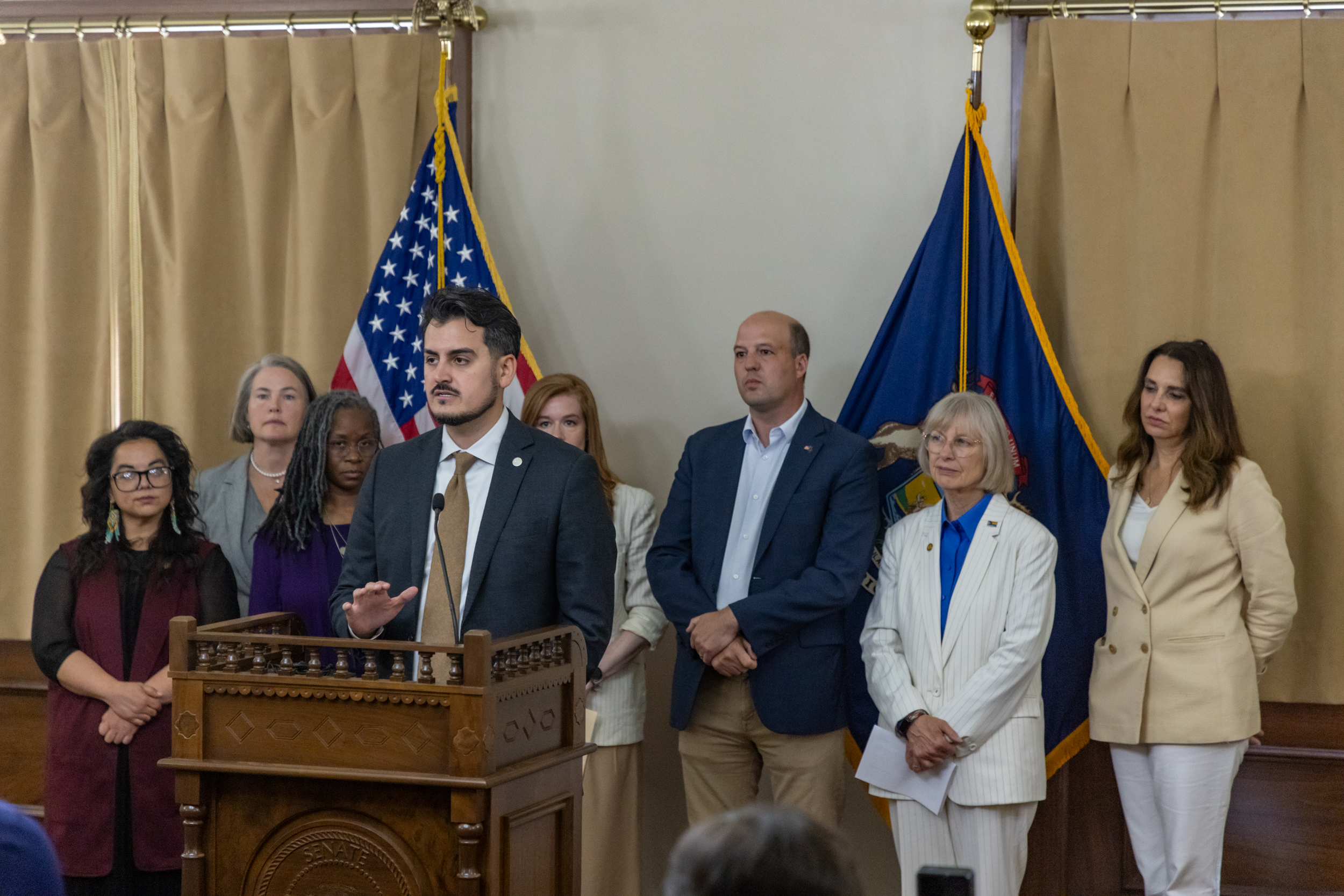 Senator Camilleri speaking at a press conference on Data Centers