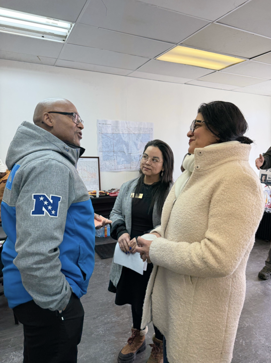 Senator Cavanagh and Congresswoman Rashida Tlaib speaking with a constituent at the District Office Opening