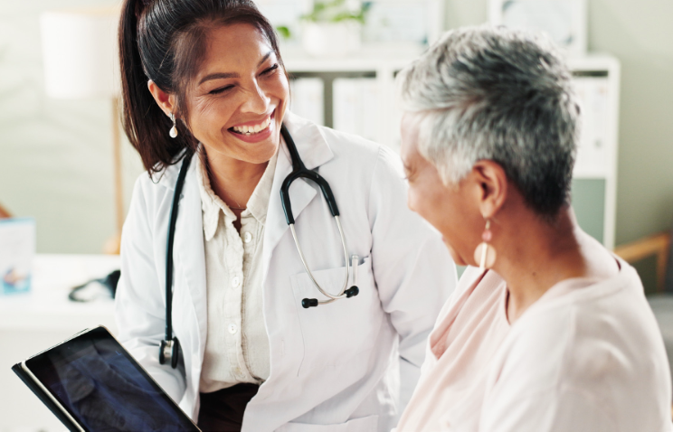 Doctor smiling at patient