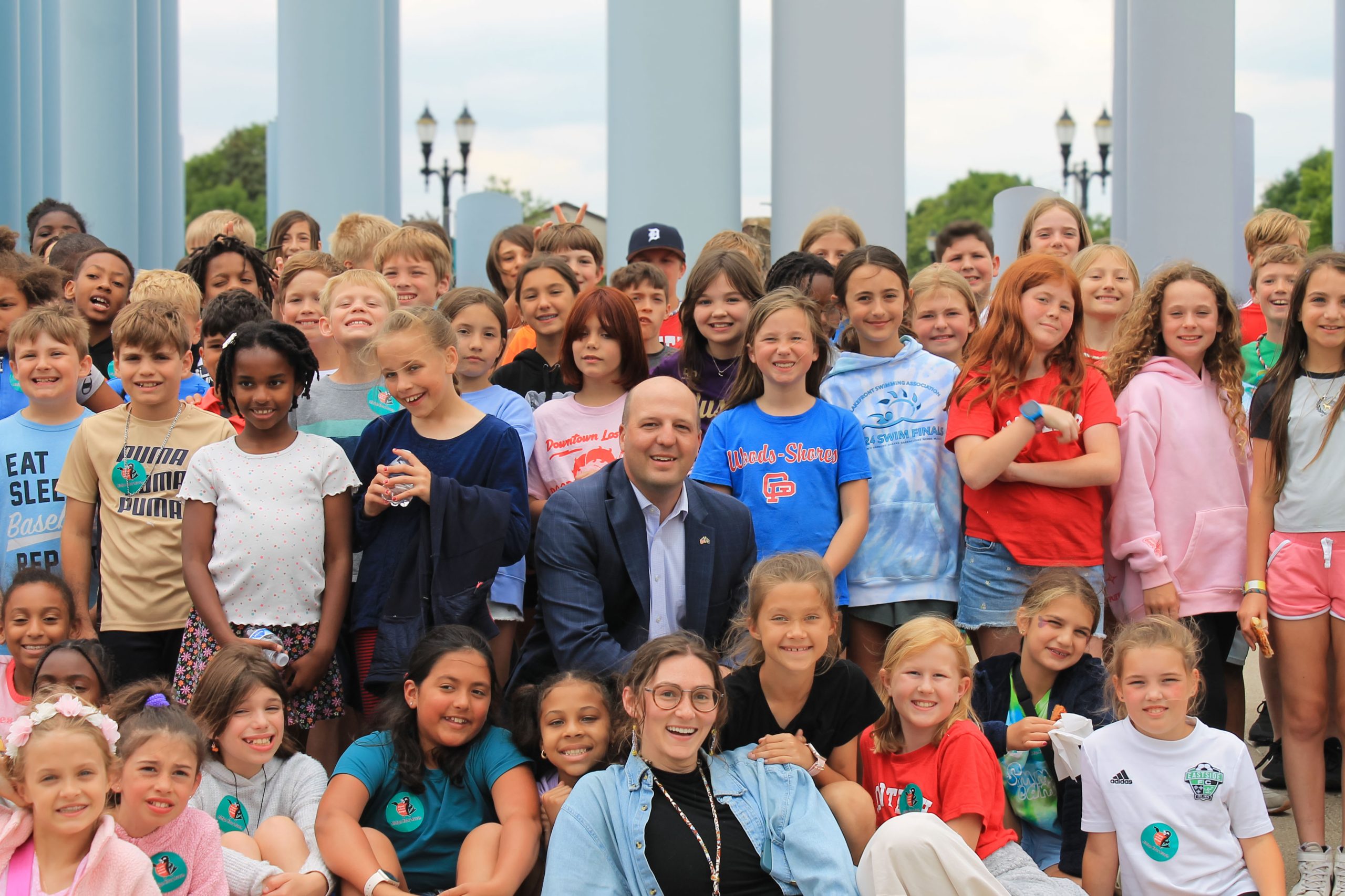 Sen Hertel with a group of children from Mount Clemens