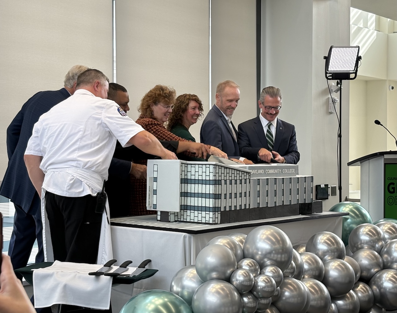 Team McMorrow was there for the grand opening and tour. Most openings have a ribbon cutting, but appropriately, this celebration had a ceremonial cake cutting!