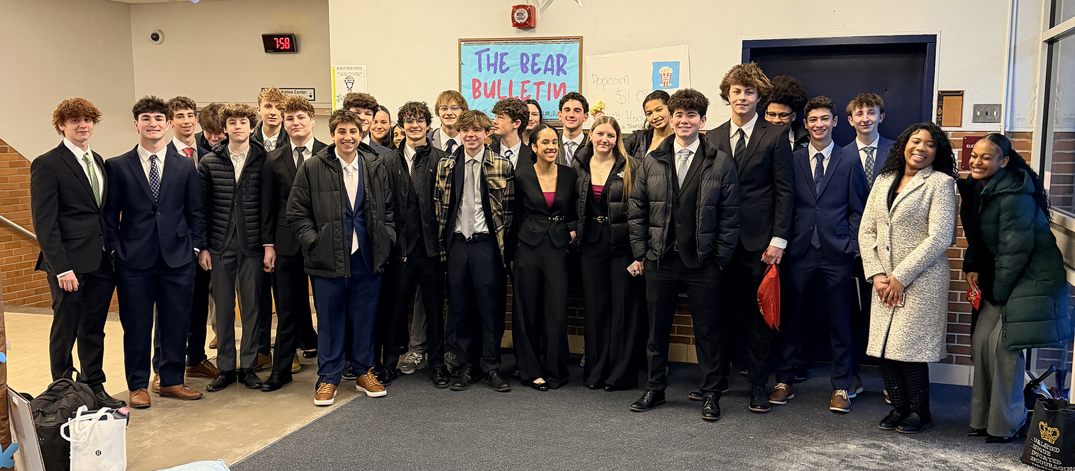 Berkely Highschool DECA qualifiers. A group of highschool students posing in business attire