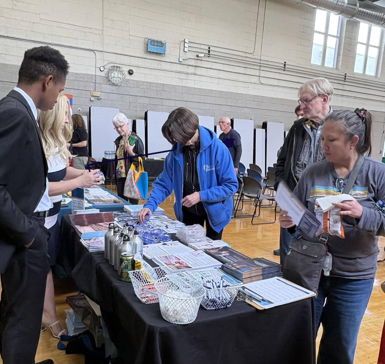 Tabling resources at the Lower Costs, Higher Wages Town Hall