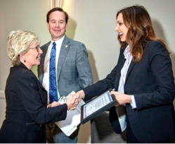 Senator Polehanki presenting an award to Livonia Mayor Maureen Brosnan in recognition of her leadership on the Senior Center revitalization