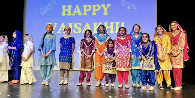 Celebrating the second annual Vaisakhi celebration in Plymouth. People dancing on stage