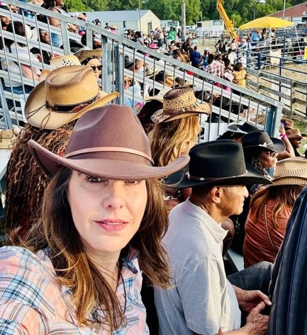 Senator Polehanki wearing a cowboy hat at the Midwest Invitational Black Rodeo