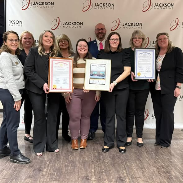 Best of Jackson Awardees posing with their tributes from Senator Shink