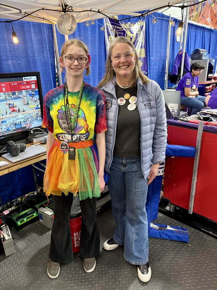 Senator Shink at First Robotics with a young teenage girl
