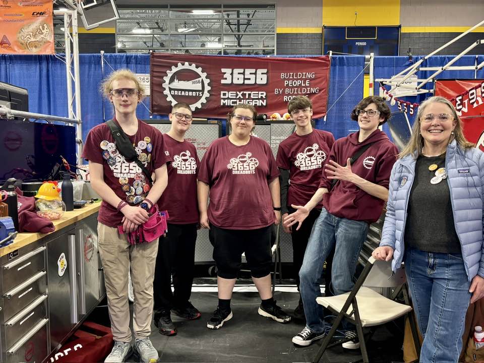Senator Shink at First Robotics with a group of highschool students