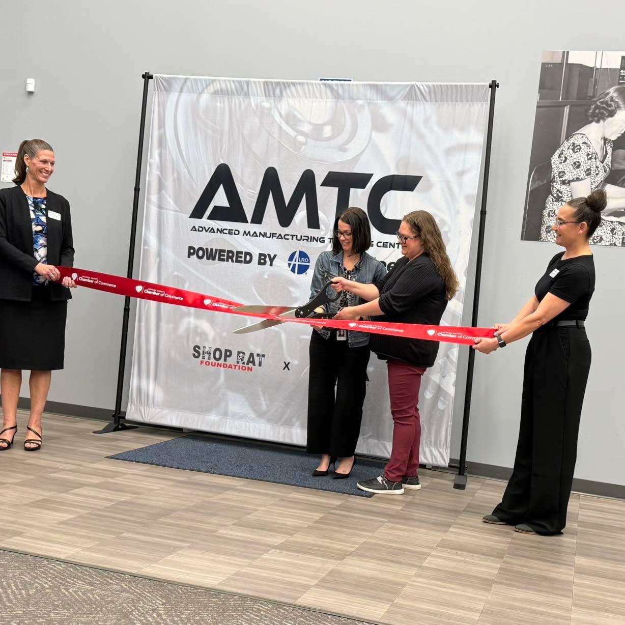 Grand opening and ribbon cutting by 4 women for the Advanced Manufacturing Training Center