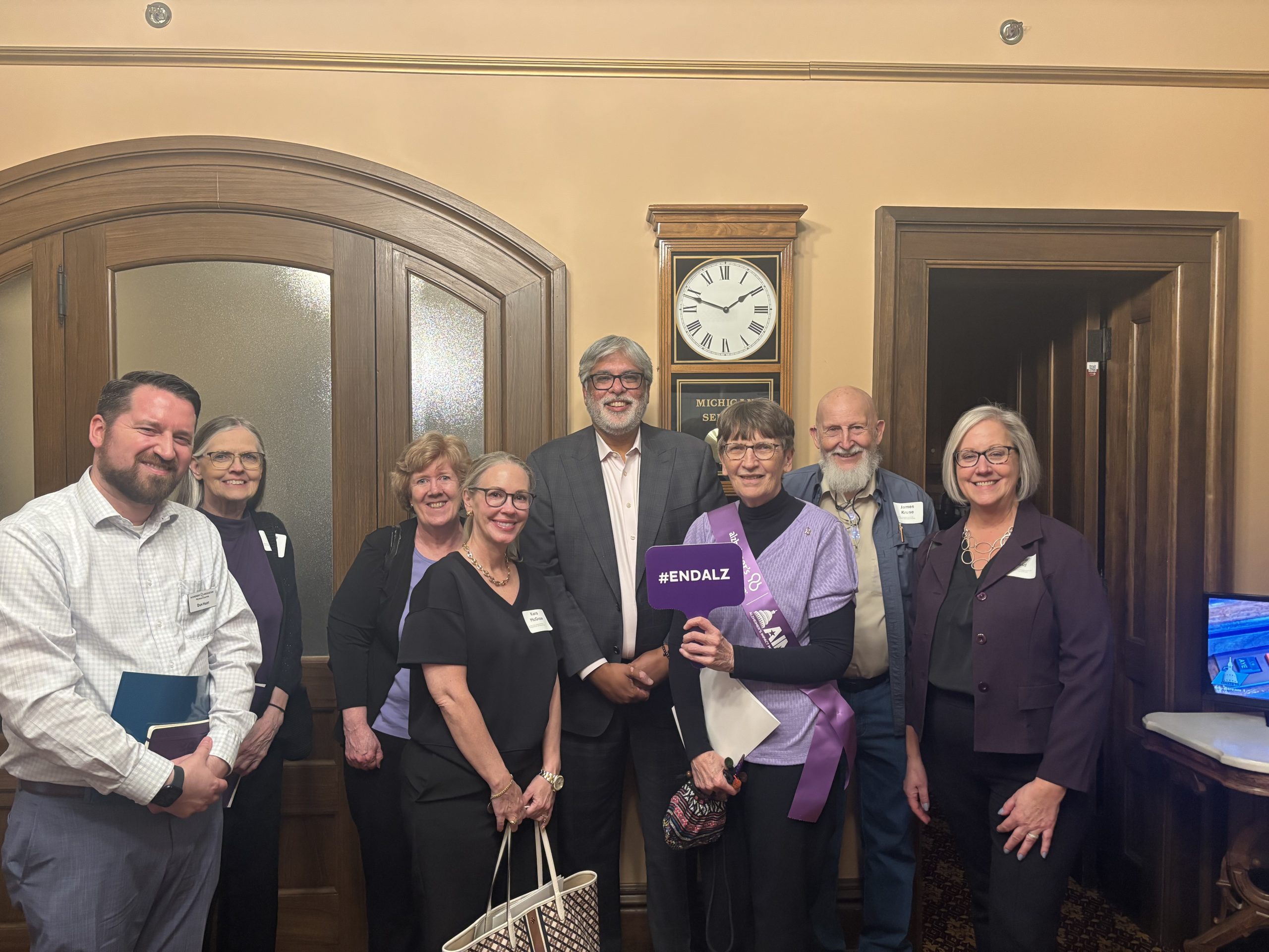Sen Singh posing with advocates from across Michigan 
